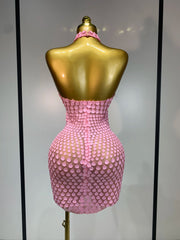 Sparkle in the Jamilla pink sequin backless mini dress. Luxury halter party dress for birthdays, singers, stage shows, and nightlife.
