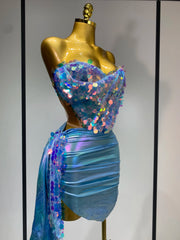 Mannequin Wearing a Sparkly Sequins Two Piece Set Birthday Outfit with Glittering Crop Top and Matching Mini Skirt, Styled for Luxe Celebrations