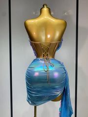 Mannequin Wearing a Sparkly Sequins Two Piece Set Birthday Outfit with Glittering Crop Top and Matching Mini Skirt, Styled for Luxe Celebrations