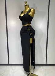 Black and red floral bandage two piece outfit with fitted top and skirt.