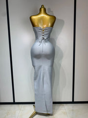 Jasmine strapless grey bandage dress with beading details and backless design for evening parties.