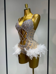 Blair Starlight feather bodysuit with glamorous feathers and shimmering details.