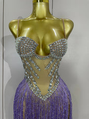 Cleo sheer mesh long dress with rhinestones, glitter, and tassel details for women’s evening, club, or stage wear.