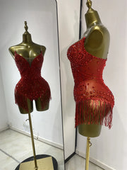 Shine in the Bridgette red rhinestone tassel mesh bodysuit. Glamorous stage outfit for performances, birthdays, parties, and nightclub events.