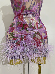 Celebrate in style with the Karina rhinestone feather embroidered bodycon dress. Elegant party dress for birthdays, cocktails, and special events.