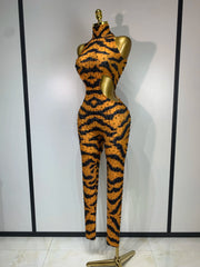 Sparkly rhinestone tiger pattern tight fitting jumpsuit for women, luxury party and stage outfit.
