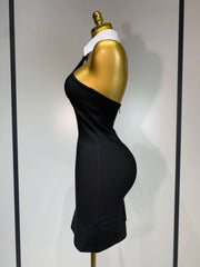 Shayla women’s black mini bodycon dress with white shirt collar and backless design for parties or club events.