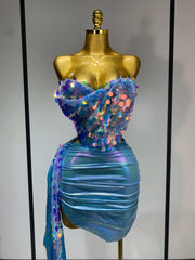Mannequin Wearing a Sparkly Sequins Two Piece Set Birthday Outfit with Glittering Crop Top and Matching Mini Skirt, Styled for Luxe Celebrations