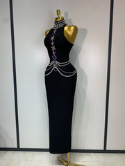 Gwen sleeveless bandage dress in a bodycon fit featuring luxury diamond crystal embellishments and a sculpted silhouette.