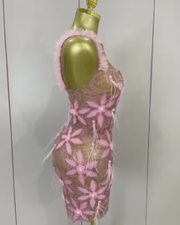 Tati wearing a sparkly diamond flowers feathers short dress for prom night.