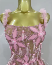 Tati wearing a sparkly diamond flowers feathers short dress for prom night.