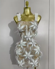 Tati wearing a sparkly diamond flowers feathers short dress for prom night.