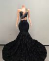 Kyra black sparkly mermaid prom dress with shimmering sequin details and elegant fitted design.