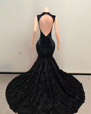 Kyra black sparkly mermaid prom dress with shimmering sequin details and elegant fitted design.