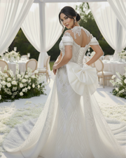 Classic short sleeve wedding dress with fitted bodice and sweep train for elegant bridal wear.