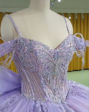 Lavender Quinceañera ball gown with sparkle tulle skirt and crystal embellished bodice