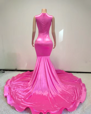 Luxury evening gown with rose rhinestone appliqué and beaded embellishments, styled for formal events and high-glamour occasions.