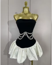 Milan wearing a strapless beading patchwork mini bandage dress for prom night.