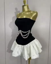 Milan wearing a strapless beading patchwork mini bandage dress for prom night.