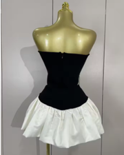 Milan wearing a strapless beading patchwork mini bandage dress for prom night.