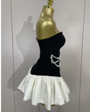 Milan wearing a strapless beading patchwork mini bandage dress for prom night.