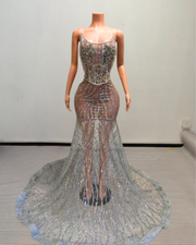 Skylar sparkly silver prom dress with shimmering sequins and elegant fitted design.