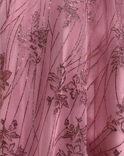 Sparkling pink quinceañera ball gown with off-shoulder sleeves, satin peplum, and glitter tulle skirt.