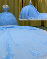 Bejeweled off-shoulder gown with 3D floral lace and star embellishments for proms, galas, or special occasions.