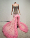 Pink and silver crystal mermaid prom dress with dramatic ruffled ostrich feather train
