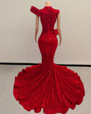 Mermaid prom dress with flounce detailing and a long shimmering sequin train