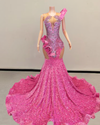 Mermaid prom dress with flounce detailing and a long shimmering sequin train