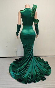 Emerald green velvet and sequin brocade mermaid gown with one shoulder drape