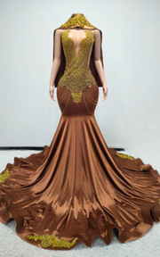 Brown and Gold Cleo beaded mermaid prom dress with detachable beaded cape for prom, evening parties, or red carpet events.