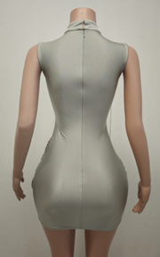 Sheer rhinestone mesh mini dress with sparkling details for parties and nightlife.