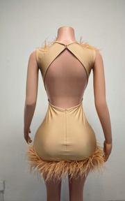 Sparkly gold mini birthday dress with a fitted silhouette for birthday parties and celebrations.