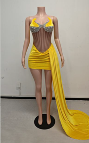 Short birthday dress with sweetheart neckline and sparkling beadwork for party and celebration wear.