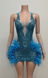 Blue mini birthday dress with rhinestones and feather details for parties and celebrations.