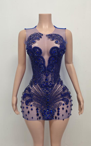 Sheer mini birthday dress with crystal beading and see-through mesh for party and nightlife wear.