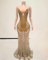 Luxury backless gold crystal mesh see-through long evening dress for women, embellished with sparkling crystals.