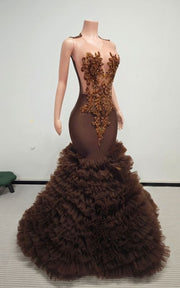 Luxury formal gown featuring bronze embellishments and layered tulle