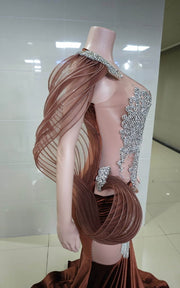 Brown velvet mermaid gown with silver filigree bodice and crystal fringe detail