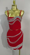 Shine in the Kristi diamond chain two-piece bandage mini dress set. Sexy bodycon outfit for parties, birthdays, clubs, and special events.