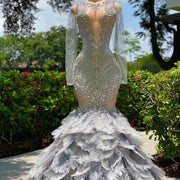 Full Bodice Rhinestone Prom Dress V-Cut Neckline Open Back with Lower Zipper Closure  Feather Train MermaidGown